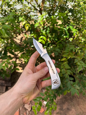 Canivete com abridor de garrafa