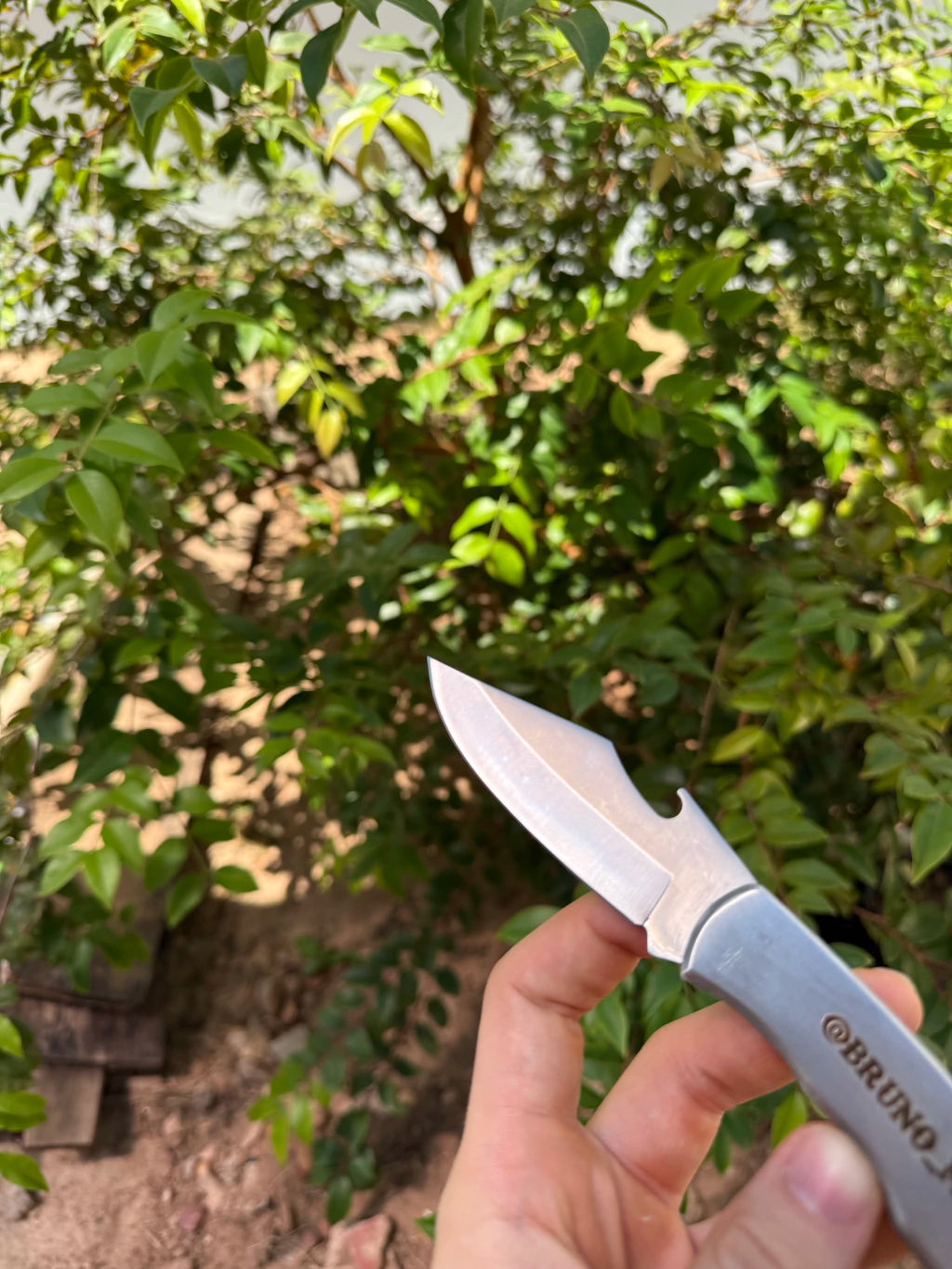 Canivete com abridor de garrafa