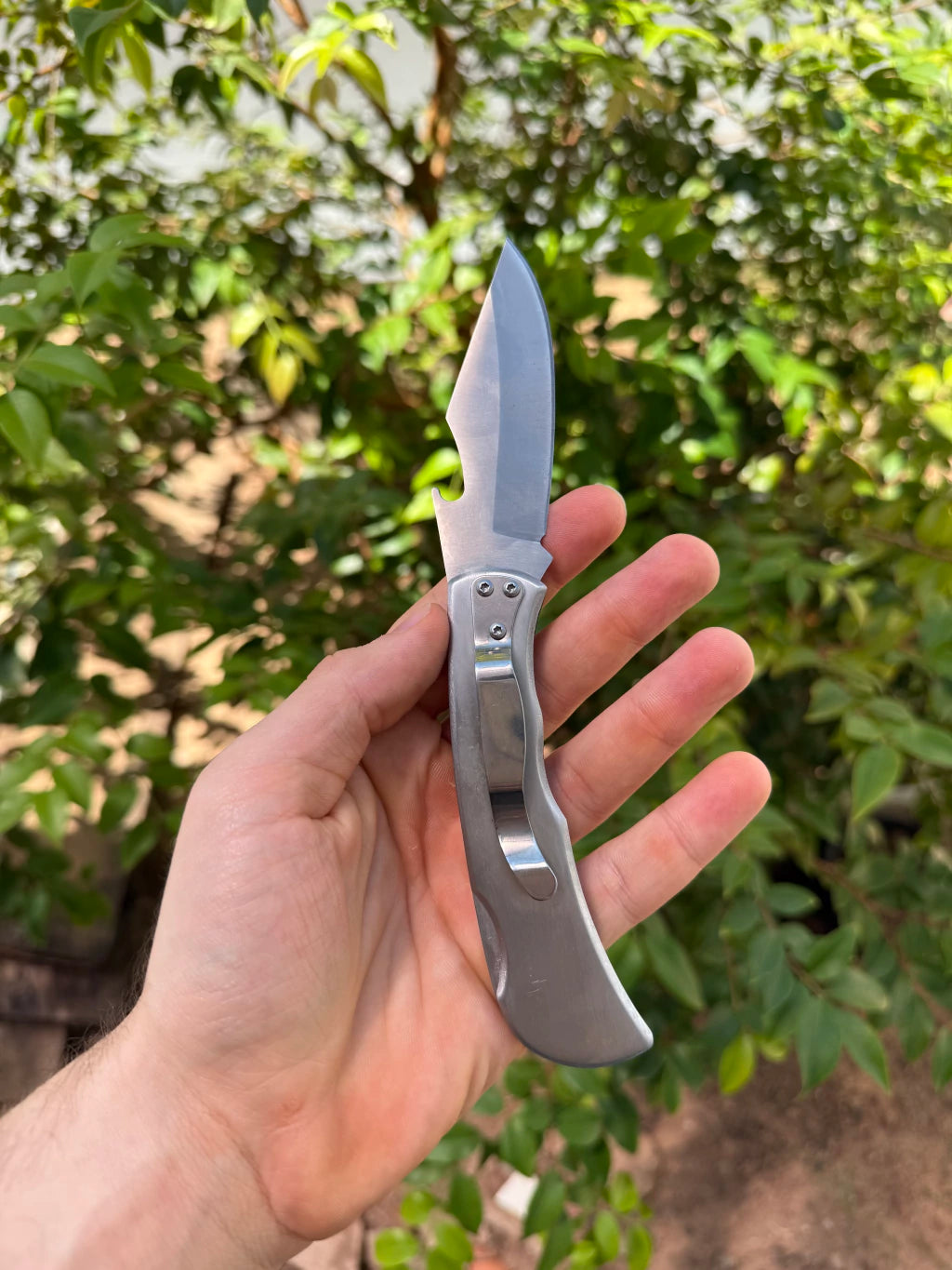 Canivete com abridor de garrafa